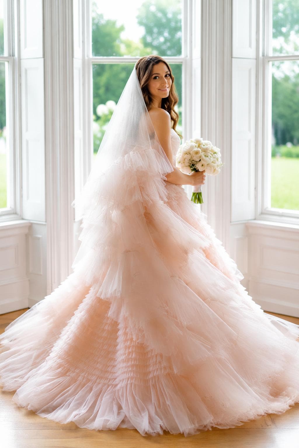 Ethereal bride in blush ruffles and cathedral veil